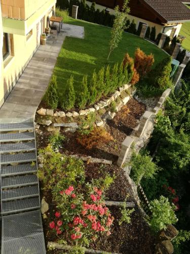 an overhead view of a garden with flowers and plants at Bergschlössl in Goldegg
