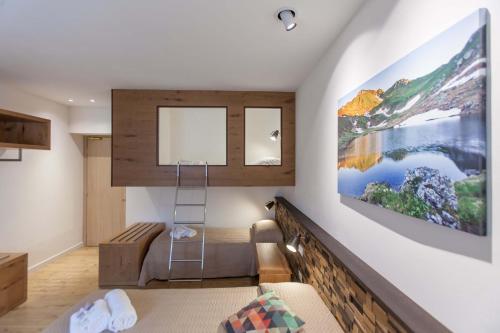 Postel nebo postele na pokoji v ubytování Grand Hotel Gortani