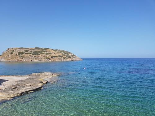 a small island in the middle of the ocean at Mochlos Beach Villa Seafront house in Mochlos