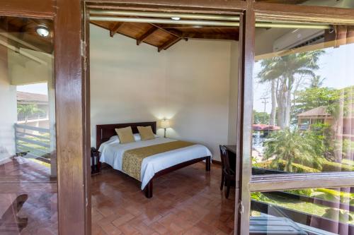 Katil atau katil-katil dalam bilik di Hotel Terraza del Pacifico