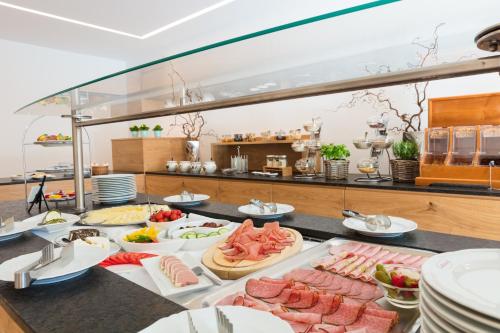 a buffet of food on a cruise ship at Garten - Hotel Sallerhof in Salzburg