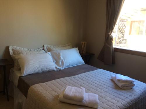 Кровать или кровати в номере Deptos Punta Nevada