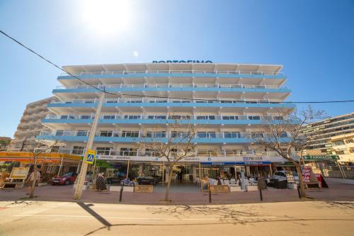 a large apartment building in front of a street at Pierre&Vacances Mallorca Portofino in Santa Ponsa