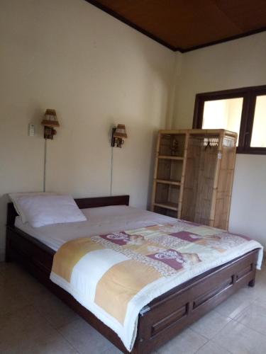 Ένα ή περισσότερα κρεβάτια σε δωμάτιο στο Mimba Private House