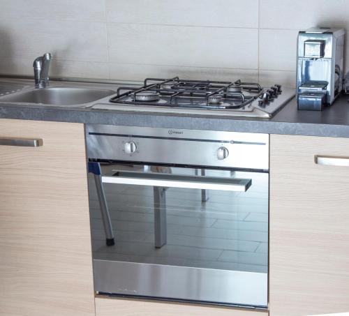 Kuchyň nebo kuchyňský kout v ubytování Residenze Roscioli