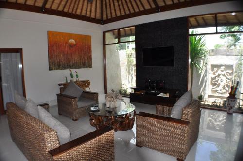 Μια τηλεόραση ή/και κέντρο ψυχαγωγίας στο Gili Palms Villas