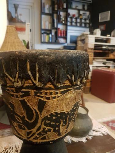 a vase sitting on a table in a store at Guesthouse Hotel My Home in Prizren
