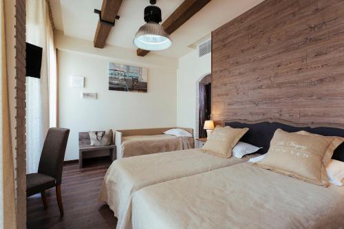 Postel nebo postele na pokoji v ubytování Best Western Maison B Hotel