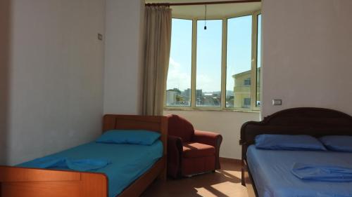 Postel nebo postele na pokoji v ubytování Apartments Vila Cala