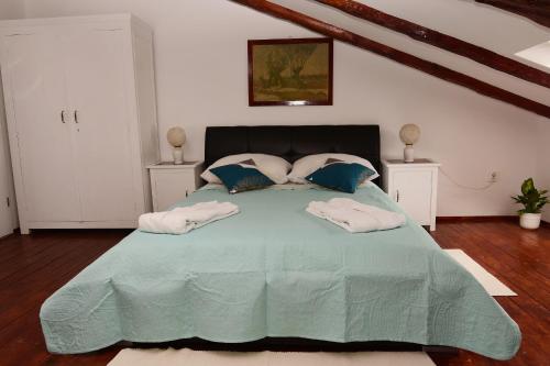 Posteľ alebo postele v izbe v ubytovaní Apartments Diella & Gabriela Opatija