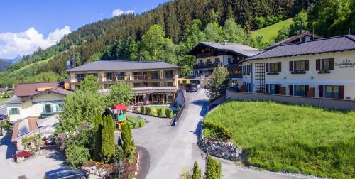 an aerial view of a resort in the mountains at Landhotel Laudersbach in Altenmarkt im Pongau