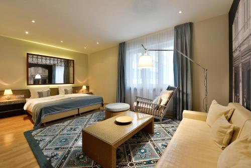 Krevet ili kreveti u jedinici u objektu Best Western Premier Hotel Victoria