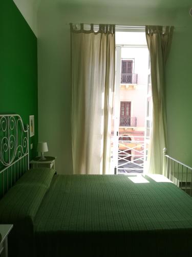 L'alberghetto Casavacanza Milazzoにあるベッド