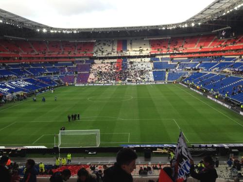 a soccer match in a stadium with a soccer field at La petite Maison dans la Croix Rousse in Lyon