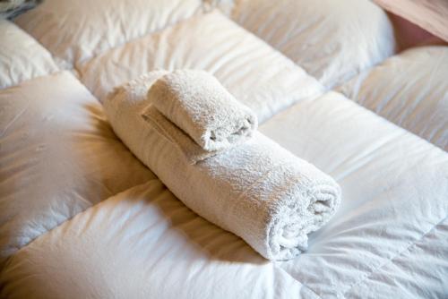 Кровать или кровати в номере San Polo Home