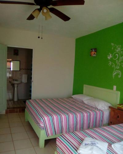 Katil atau katil-katil dalam bilik di Hotel Quinta Mar y Selva