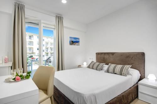 Posteľ alebo postele v izbe v ubytovaní Relais Le Due Costiere