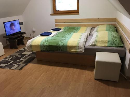 Posteľ alebo postele v izbe v ubytovaní Studio Pohoda Na Razcesti Cingov Slovensky Raj