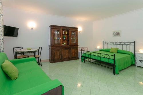 Postel nebo postele na pokoji v ubytování Casa Pamela