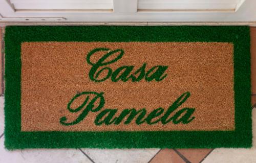 a sign that says salsa panilla sitting on the floor at Casa Pamela in Capri