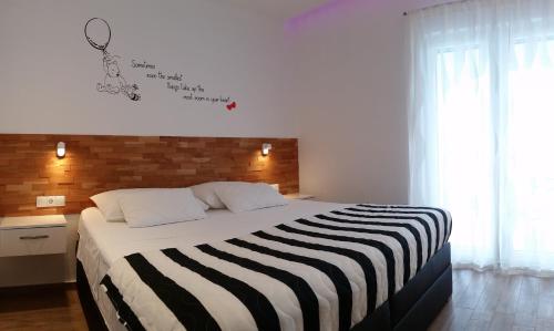 Posteľ alebo postele v izbe v ubytovaní Apartments Ursic MB