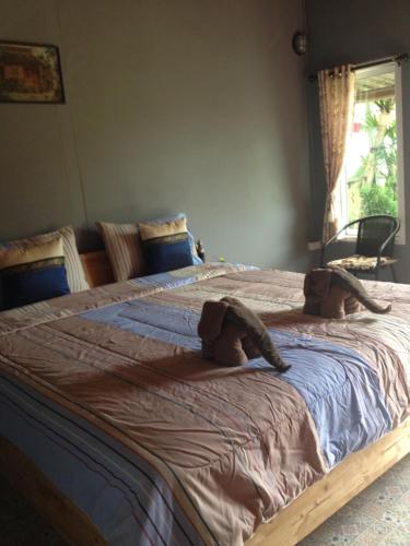 Postel nebo postele na pokoji v ubytování Milin Guesthouse