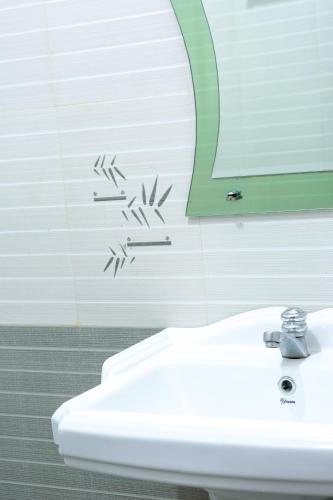 Un baño de Rupa's Hotel