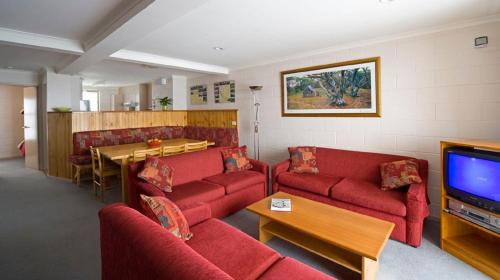 Un lugar para sentarse en Alpine View Apartments