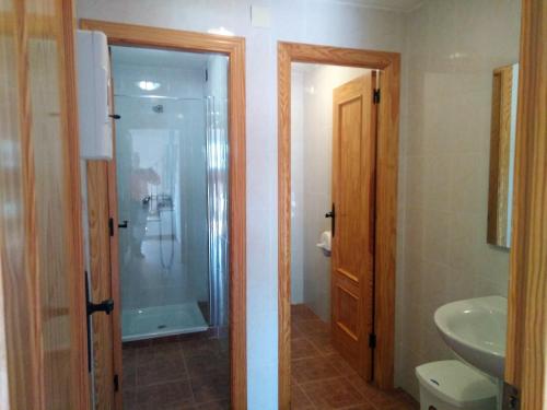 a bathroom with a shower and a sink at Magina Dream La Guardia Turismo Rural in La Guardia de Jaén