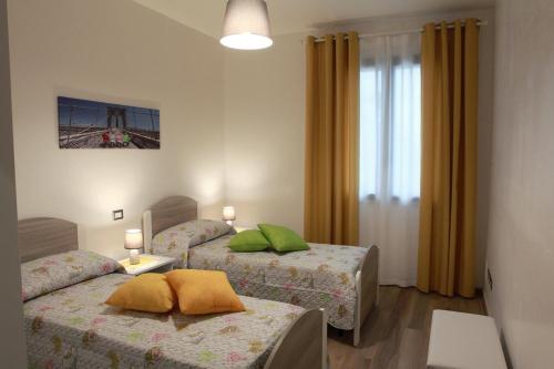 Postel nebo postele na pokoji v ubytování "Villetta Eromina"