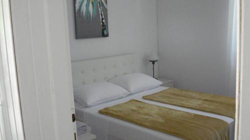 Posteľ alebo postele v izbe v ubytovaní Nevena Apartments