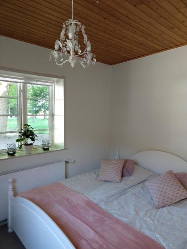 En eller flere senge i et værelse på Apartment in Danmark- Agernaesgaard Otterup