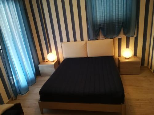 Affittacamere Massimo D'Azeglioにあるベッド