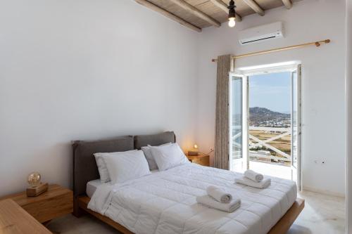 Katil atau katil-katil dalam bilik di Mykonos Divino