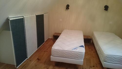 Krevet ili kreveti u jedinici u okviru objekta Maison de village/Appartement de charme avec extérieur