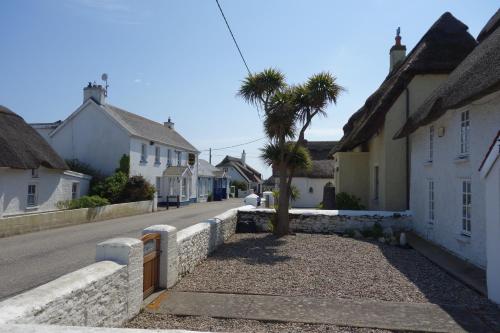 a street scene with a couple of houses at Saltees Coast in Kilmore Quay