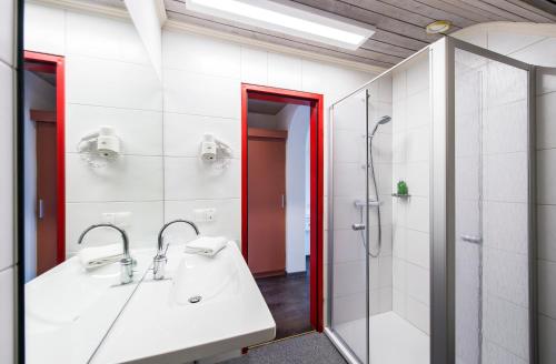 Kúpeľňa v ubytovaní Hotel Aloisia, Hotel Garni