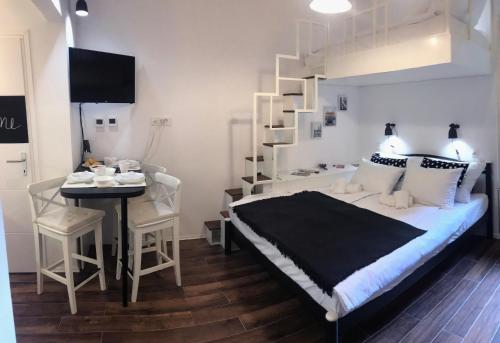 Posteľ alebo postele v izbe v ubytovaní Mely Apartment in the City Center