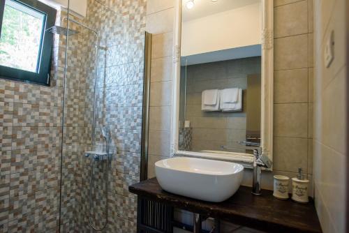 Koupelna v ubytování Belleview Suites