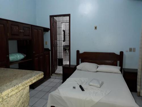 Uma cama ou camas num quarto em Plaza Hotel