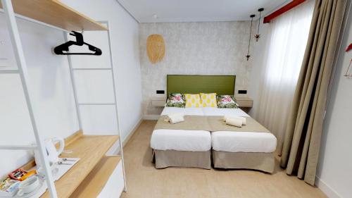 Letto o letti in una camera di Hostal Boutique La Española