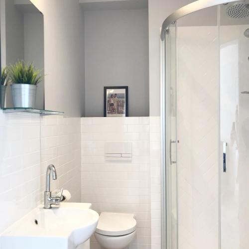 Ένα μπάνιο στο Apartamenty Nadmorska