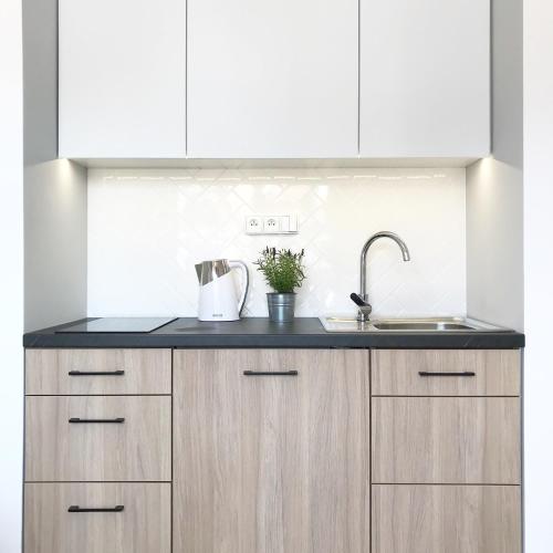 Η κουζίνα ή μικρή κουζίνα στο Apartamenty Nadmorska