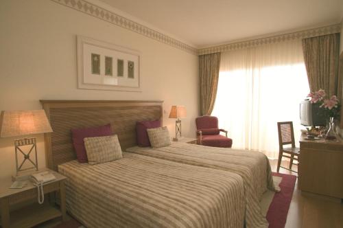 Uma cama ou camas num quarto em Quinta do Estreito