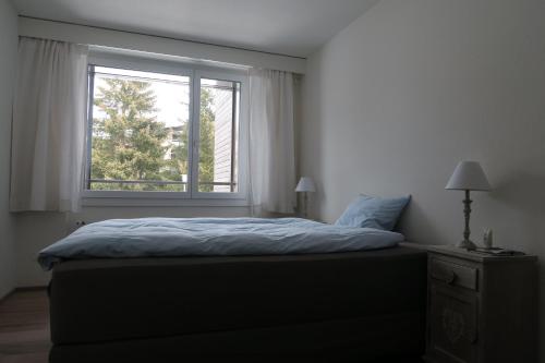Apartment Roccabella tesisinde bir odada yatak veya yataklar