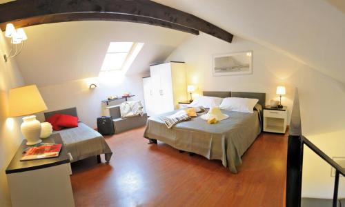 Ένα ή περισσότερα κρεβάτια σε δωμάτιο στο Residence Le Terrazze