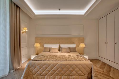 Katil atau katil-katil dalam bilik di Hotel Eliseo Terme