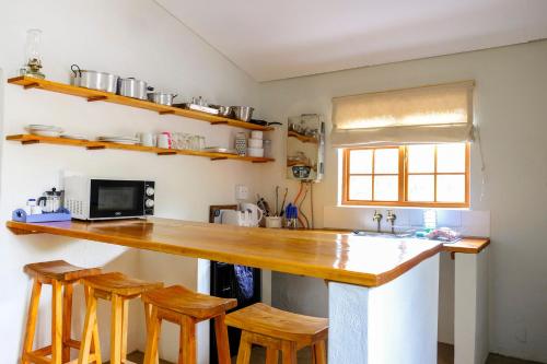 Dapur atau dapur kecil di De Bos Cottages