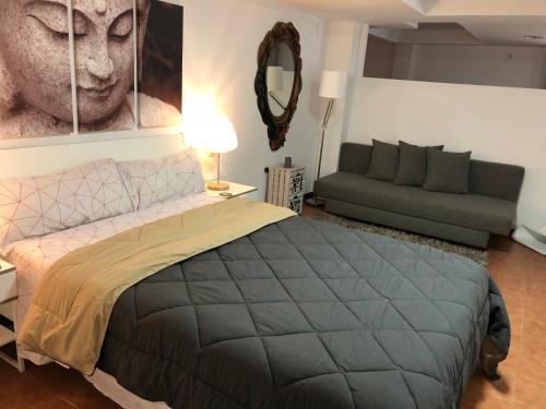 Postel nebo postele na pokoji v ubytování loft con terraza y barbacoa