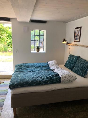 Postel nebo postele na pokoji v ubytování Vangeled Gaard B&B - Apartments
